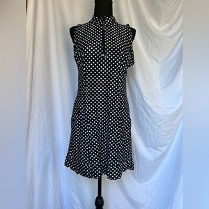 Tzu Tzu black and white polkadot golf dress. Black shorts included